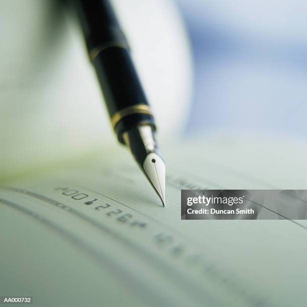 Check Stock Writing Checkbook Writing A Check Photos and Premium High Res Pictures - Getty ...