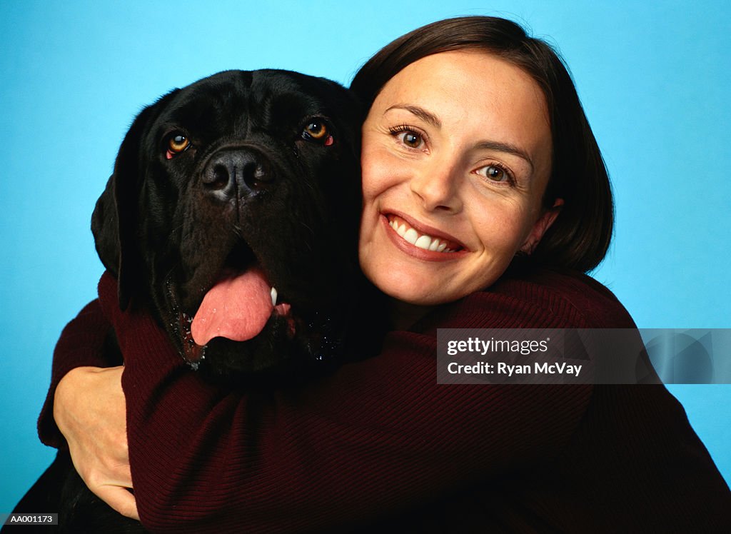 Woman Hugging Her Dog