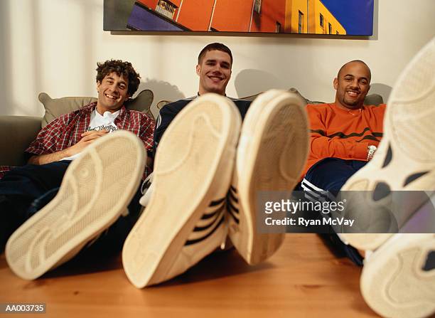 portrait of three men and their shoes - only mid adult men stock pictures, royalty-free photos & images