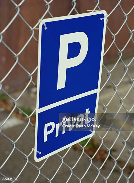 german private sign hanging on a fence - restricted area sign stock pictures, royalty-free photos & images