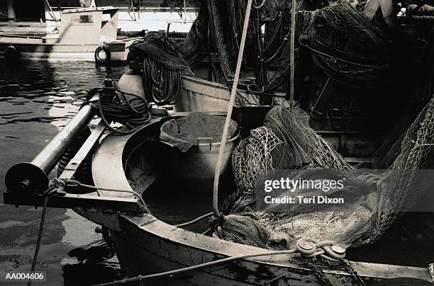 close-up of a fishing net in a fishing boat - net fishing stock pictures, royalty-free photos & images
