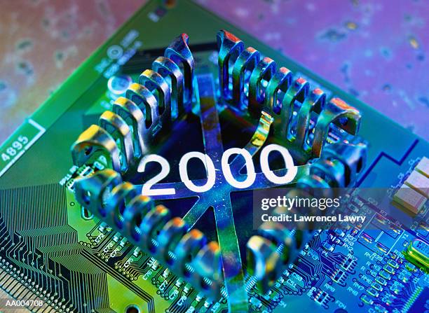 2000 projected onto a computer chip - computer bug stock pictures, royalty-free photos & images