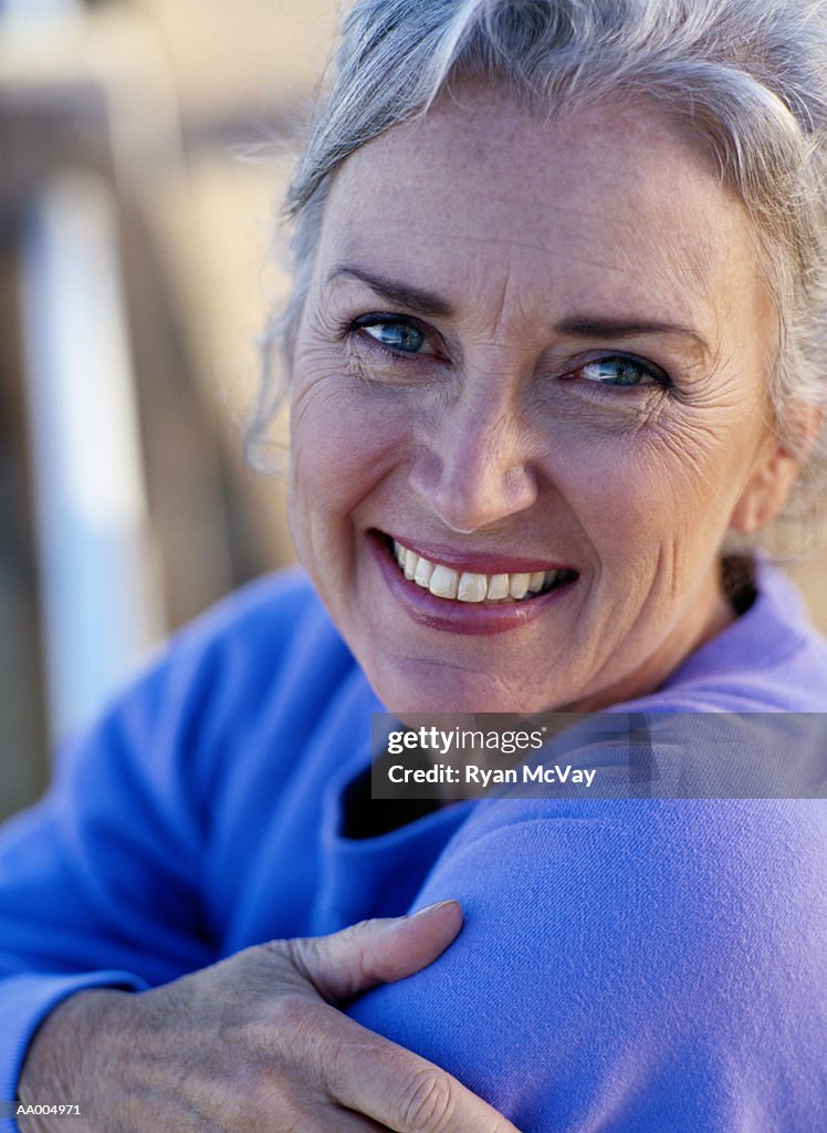 Mature woman smiling, portrait