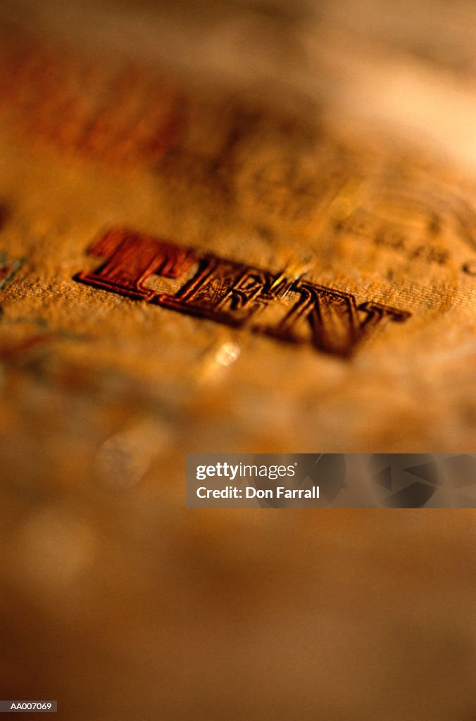 The Word Ten on an English Pound