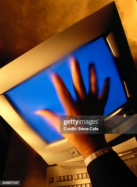 Hand Reaching Out Of Computer Screen Photos et images de collection ...