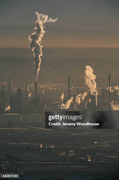 pollution rising from factories in ciudad juarez - ciudad stock pictures, royalty-free photos & images