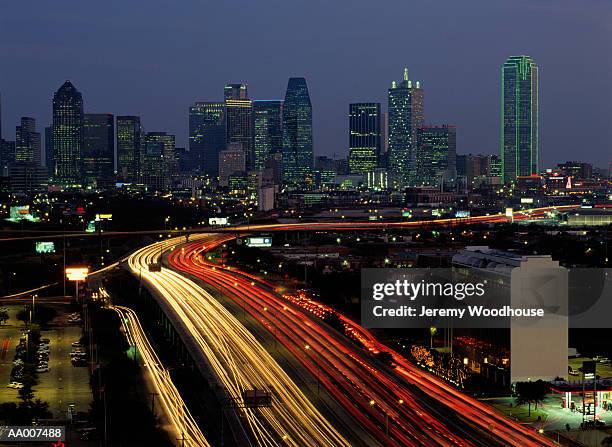 interstate-35e and the dallas skyline - interstate 35 stock pictures, royalty-free photos & images