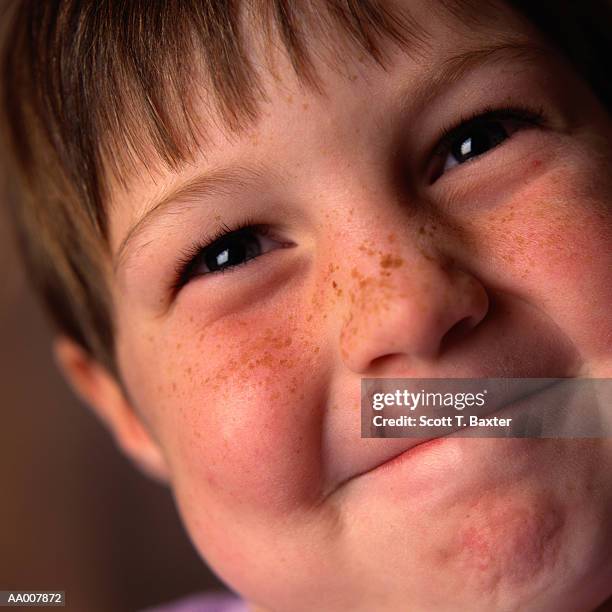 close-up of a young girl holding breath - wonky fringe stock pictures, royalty-free photos & images