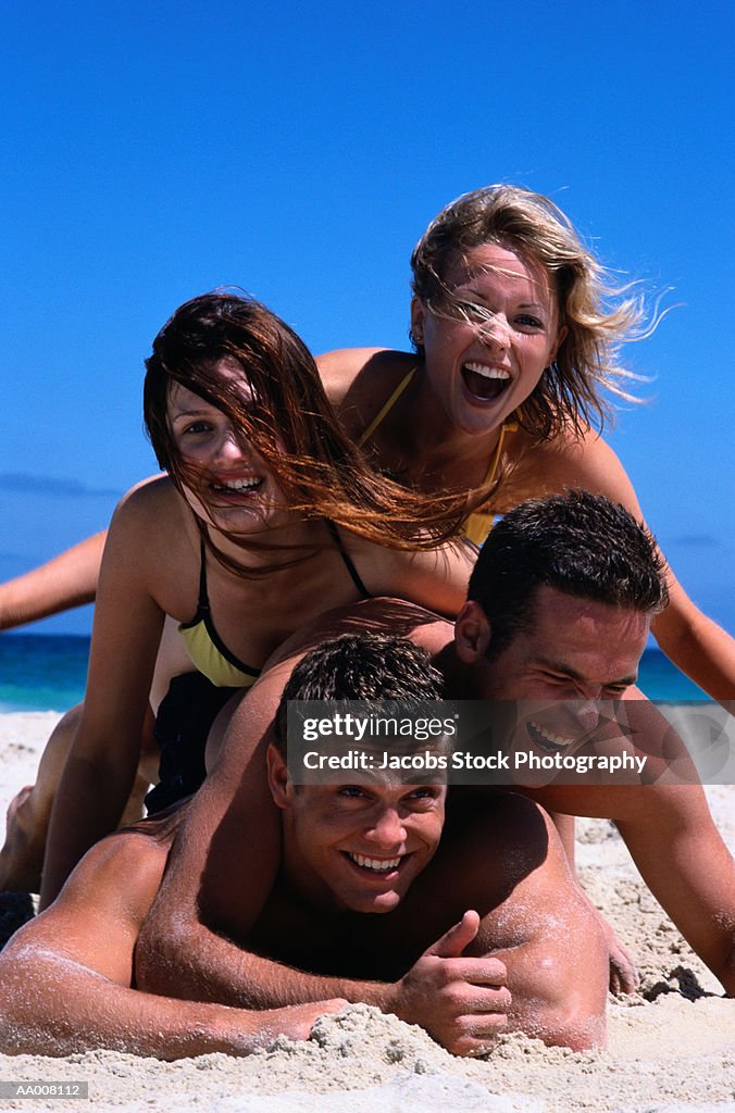 Couples in a Stack on the Beach
