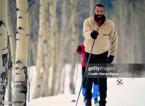 cross-country skiers - cross country skiing stock pictures, royalty-free photos & images