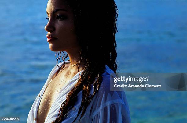 profile of a girl by the sea - amanda long stock pictures, royalty-free photos & images