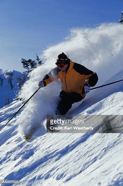 skier skiing - snowbird lodge stock pictures, royalty-free photos & images
