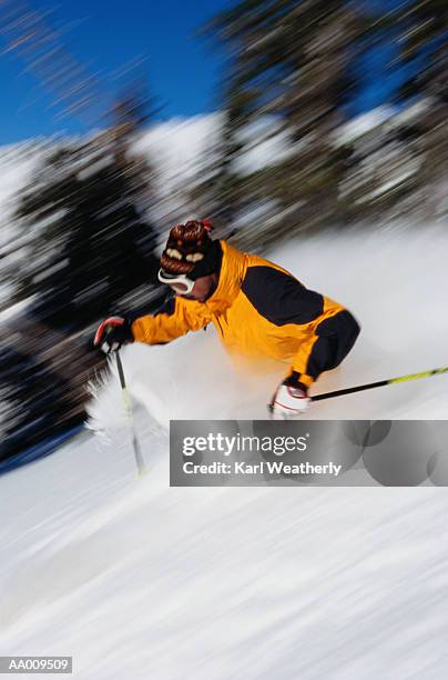 skier skiing - schwenk stock-fotos und bilder