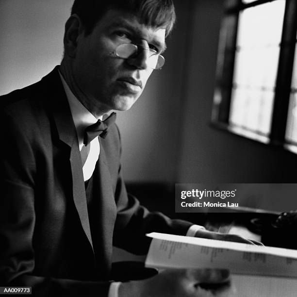 businessman thinking at desk - monica askew stock pictures, royalty-free photos & images