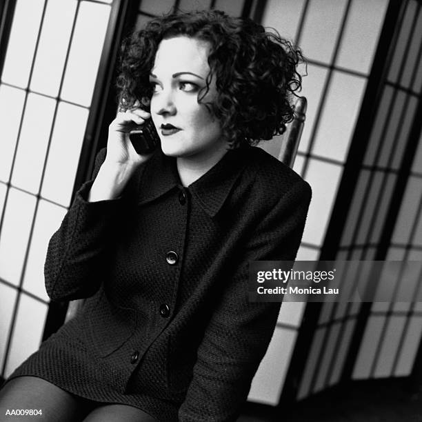 businesswoman on a cellular phone - monica askew stock pictures, royalty-free photos & images