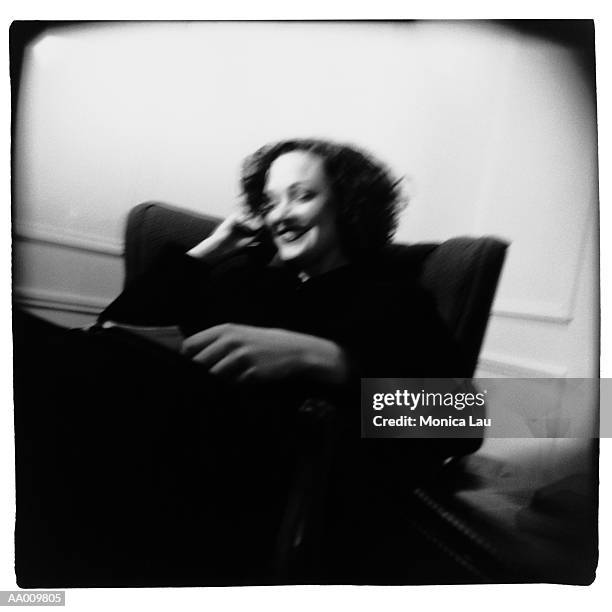 portrait of a businesswoman on a cellular phone - monica askew stock pictures, royalty-free photos & images