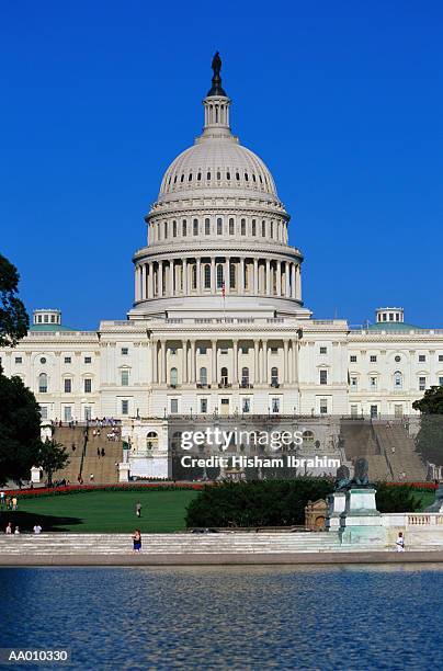 united states capitol building - americas society and council of the americas hosts talk with pacific alliance presidents stockfoto's en -beelden