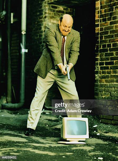 32 Pointing Gun At Computer Stock Photos, High-Res Pictures, and Images ...