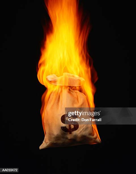 110 Bag Of Money Fire Stock Photos, High-Res Pictures, and Images ...