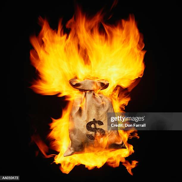 Bag Of Money Fire Photos and Premium High Res Pictures - Getty Images