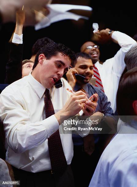 floor traders at the stock exchange - trading room stock pictures, royalty-free photos & images