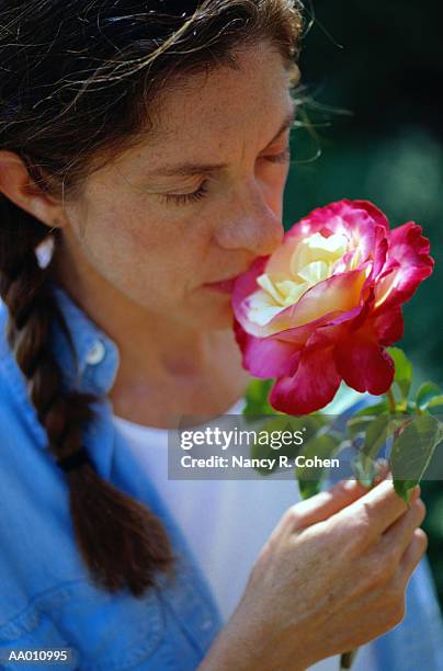 Smelling Roses Inbloom 281 Nancy Bloom Stock Photos, High-Res Pictures, and Images - Getty Images