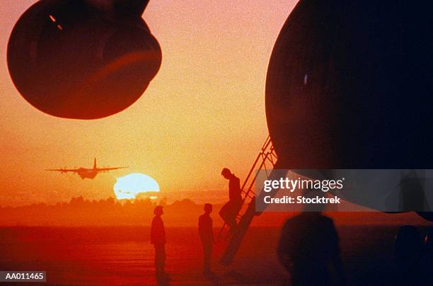 military airplanes landing on a military base - namibia airplane stock pictures, royalty-free photos & images