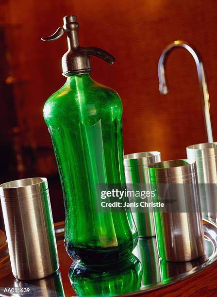 seltzer bottle on a tray with metal drinking cups - metal serving tray stock pictures, royalty-free photos & images