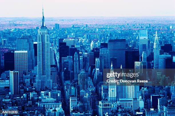 aerial view of midtown manhattan skyscrapers - midtown stockfoto's en -beelden