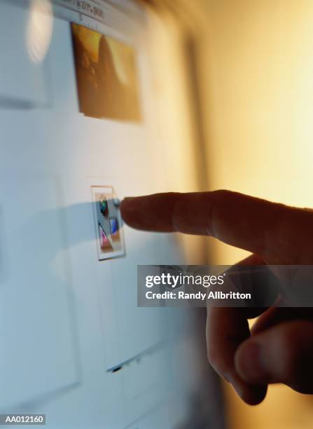 finger touching a computer screen - installation of memorial honors victims of ghost ship fire in oakland stockfoto's en -beelden