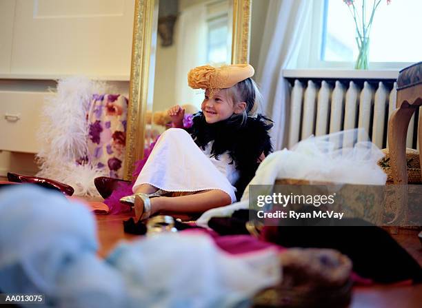 girl playing dress-up - boa di piume foto e immagini stock