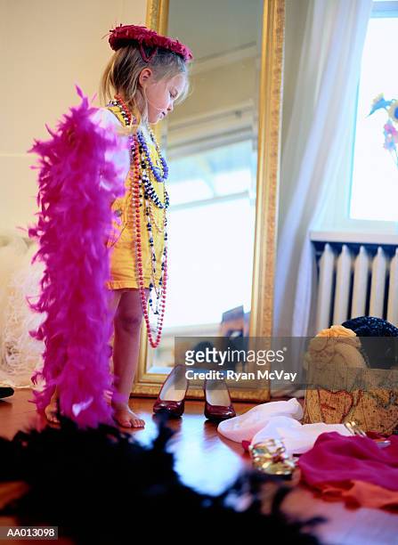 girl playing dress-up - full length mirror stock pictures, royalty-free photos & images