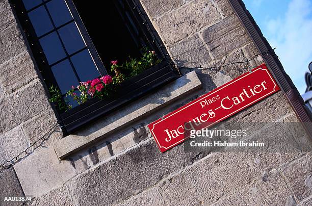 street sign in old montreal - place jacques cartier stock pictures, royalty-free photos & images