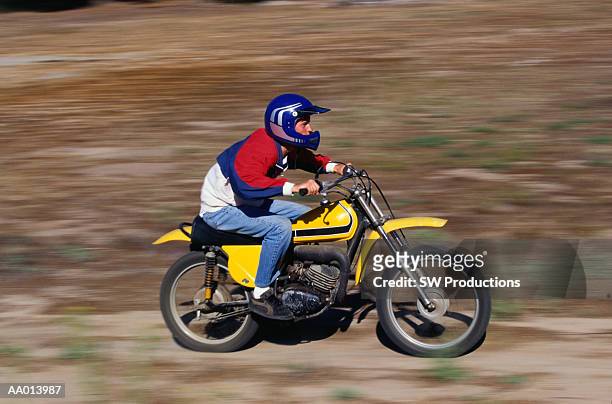 teen boy riding a motorcycle - toma panorámica fotografías e imágenes de stock
