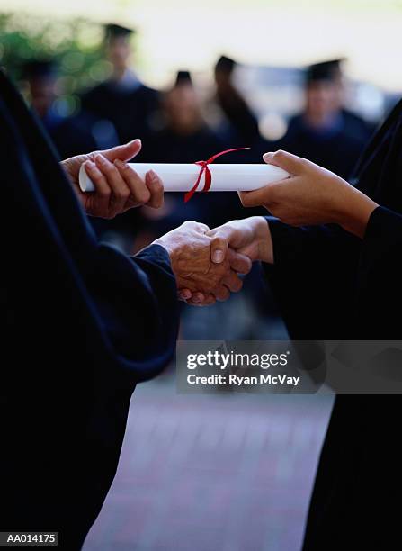 Graduation Received 2,836 Graduation Receiving Diploma Stock Photos, High-Res Pictures, and ...