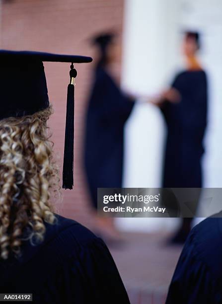Rear View Of Graduates Watching A Graduation High-Res Stock Photo ...