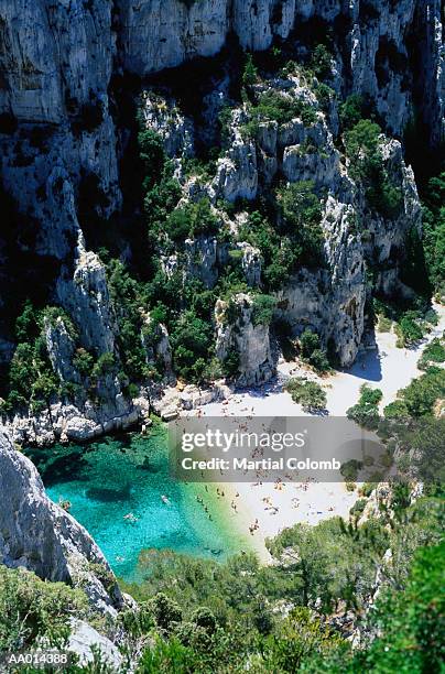 sunbathers in the calanques - calanques stock pictures, royalty-free photos & images