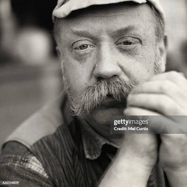 portrait of a man in contemplation - handlebar moustache stock pictures, royalty-free photos & images
