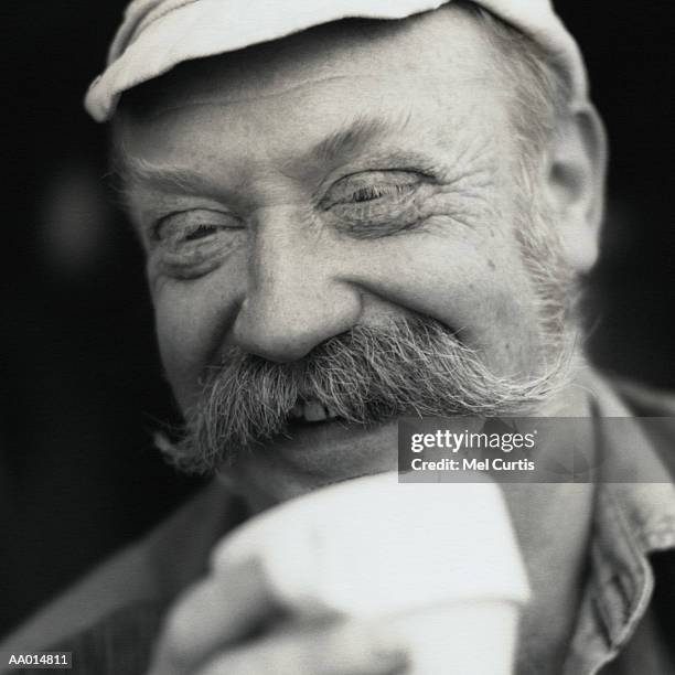 portrait of a smiling man - handlebar moustache stock pictures, royalty-free photos & images