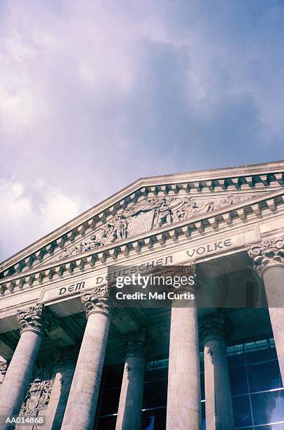 reichstag building in berlin, germany - tympanon stock-fotos und bilder