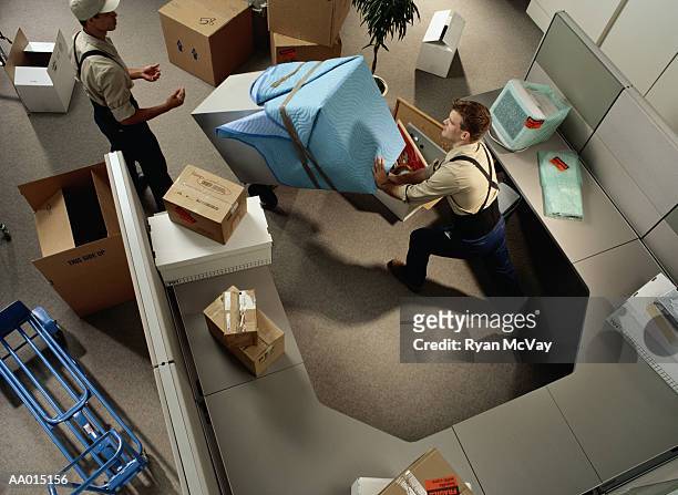 above view of moving out of a cubicle - moving office stock pictures, royalty-free photos & images