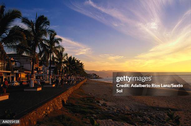 mexico, puerto vallarta, sunset on beach - puerto stock pictures, royalty-free photos & images