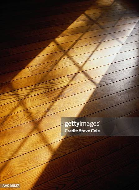 shadow of a window - floorboard stock pictures, royalty-free photos & images