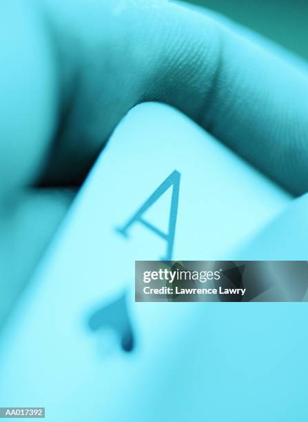 hand holding an ace of spades - ace of spades stock pictures, royalty-free photos & images