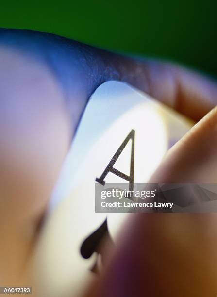 hand holding an ace of spades - ace of spades stock pictures, royalty-free photos & images