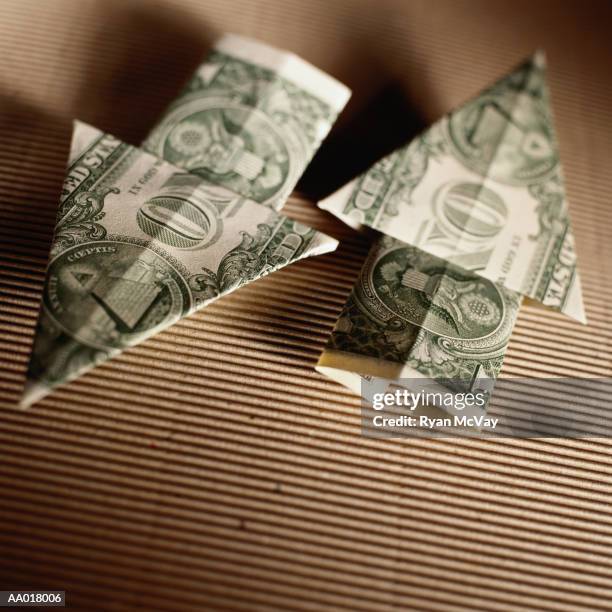 origami up and down arrows - money guidance stock pictures, royalty-free photos & images