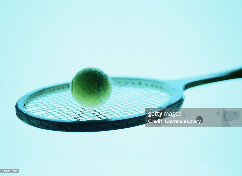 Tennis Ball on a Tennis Racket