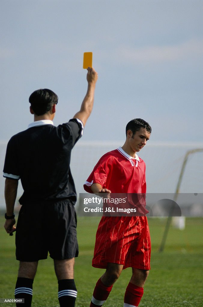 Soccer Player Getting the Yellow Card