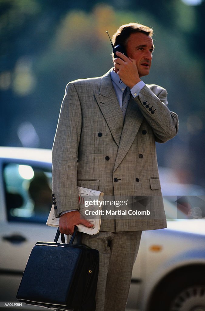 Businessman Using a cellular Phone
