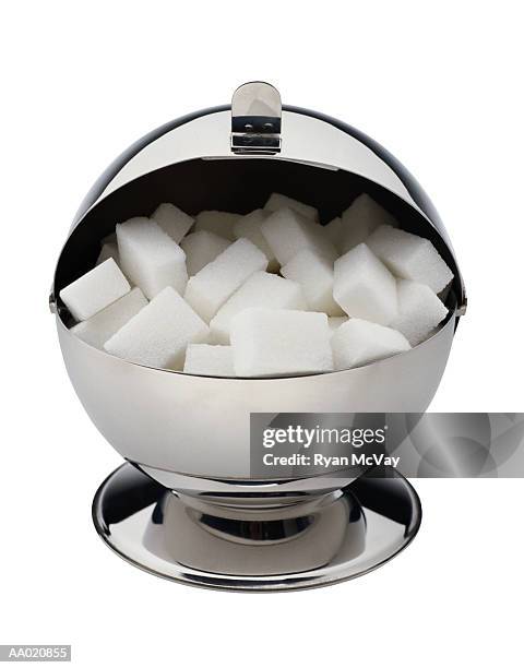 silver sugar bowl with sugar cubes - sugar bowl crockery stock pictures, royalty-free photos & images